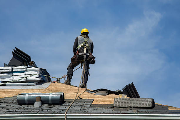Professional Roof Replacement technician working in Gladstone, MO
